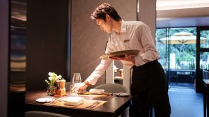 A TikTok video from a Michelin-starred restaurant host first revealed the AI-assisted diner tags now being tested in OpenTable’s Pro tools. (iStock)
