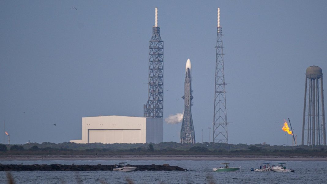 Blue Origin's New Glenn rocket sits at Cape Canaveral Space Force Station in Florida on Sunday after a launch attempt was canceled due to weather.