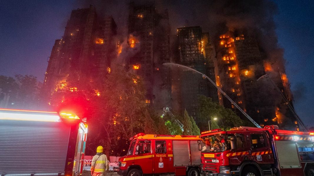 Firefighters work to extinguish a fire which broke out at Wang Fuk Court, a residential estate in the Tai Po district of Hong Kong | PTI