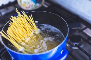 Cooking spaghetti in a pot