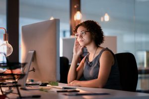 Woman looking at computer screen
