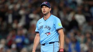 Toronto Blue Jays pitcher Max Scherzer looks to his dugout during the sixth inning in Game 4 of baseball's American League Championship Series against the Seattle Mariners in Seattle, Washington, on Oct. 16, 2025. (Lindsey Wasson/AP Photo)