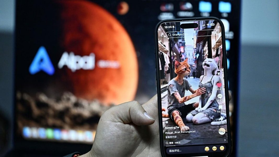 Chen Kun showing content generated by his AIpai platform on a smartphone during an interview at his office in Beijing.