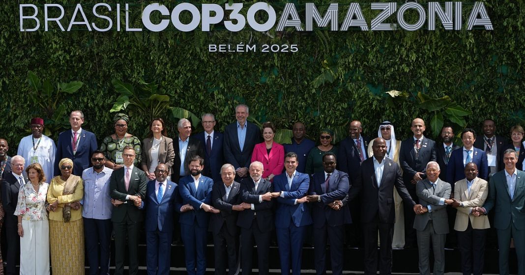 Leaders attending the COP30 UN Climate Summit pose for a group photo in Belem, Brazil, Friday, Nov. 7, 2025.