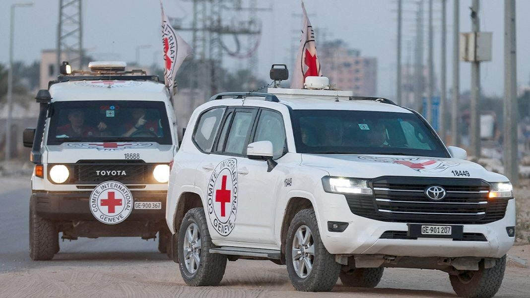 The Red Cross transports the body of a deceased hostage, who had been held in Gaza since the deadly Oct. 7, 2023, attack on Israel by Hamas, after it was handed over by Hamas, in Deir Al-Balah in the central Gaza Strip on Oct. 30, 2025. 
