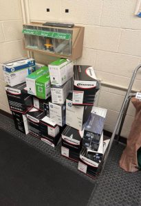 Stacks of office supplies are collected as a Goddard building is emptied.