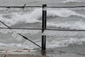Icicles form along a pier at Chicago's Loyola Beach. More cold weather is predicted for the coming weeks