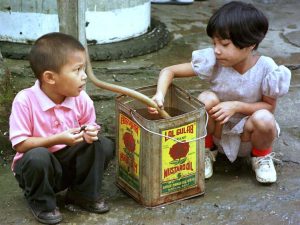 Children fill a cannister with drinking water from a public tap in Aizawl, Mizoram. (Photo: Reuters)