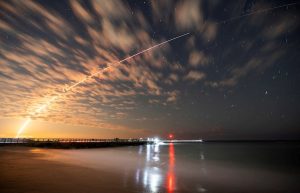 A SpaceX rocket carrying Starlink satellites is seen over launching from Cape Canaveral. (Photo: Reuters)