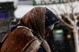A person bundle himself as he walks during the winter storm in Hoboken, New Jersey. (Photo: Reuters)