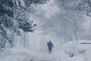 A person walks through a winter blizzard snow storm in Somerville, Massachusetts. (Photo: Reuters)