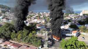 Smoke billows, following a military operation in which a government source said El Mencho was killed. (Photo: Reuters)