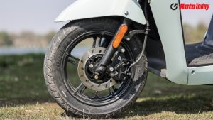 The scooter gets telescopic forks at the front and a rear shock absorber, tuned for a comfortable everyday ride.