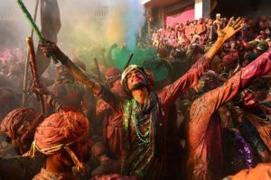 People come together, putting differences aside and celebrate Holi. (AP)