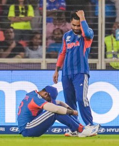 Ahmedabad: India's captain Suryakumar Yadav, sitting, and Rinku Singh after a collision while attempting a catch during the ICC Men's T20 World Cup 2026 cricket match between India and Netherlands, at the Narendra Modi Stadium, in Ahmedabad, Wednesday, Feb. 18, 2026. (PTI Photo/Gurinder Osan) (PTI02_18_2026_000919A)