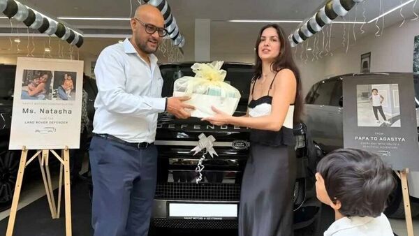 Natasa, joined by son Agastya, posed with the sleek black SUV at a Mumbai dealership.