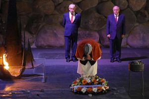 Prime Minister Narendra Modi pays respect at the Hall of Remembrance with his Israeli counterpart Benjamin Netanyahu and Dani Dayan, chairman of the Yad Vashem Holocaust Memorial Museum