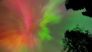 Auroras, commonly known as the northern lights in the Northern Hemisphere, are shimmering displays of colourful light in the night sky caused by charged particles from the Sun colliding with gases in Earth's atmosphere. (File Photo)