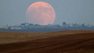 Earth's atmosphere scatters sunlight to create a deep-red lunar hue. (Photo: Reuters)