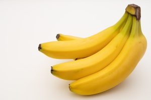 Watch out for the green stems and smooth texture in chemically ripened bananas! (Unsplash)
