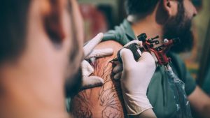 The body treats tattoo pigment as a foreign immune threat. (Photo: Getty)