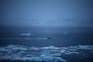 ice blocks floating in the sea during a heavy snowfall near Nuuk, Greenland. (Photo: Reuters)