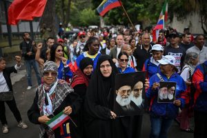 Women hold a protest in solidarity with Iran after the US-Israel strikes (AFP)