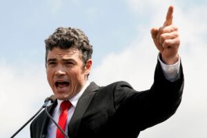 Joe Kent during a rally in 2021 when he was in the poll fray from Washington's 3rd congressional district. (Reuters File Photo)