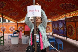 A polling official prepares a booth on the eve of Nepal's elections in Kathmandu on March 4, 2026. (AFP Photo)