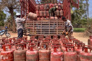 Workers load LPG cylinders in a truck, in Chikkamagaluru, Karnataka, Tuesday, March 10, 2026. (PTI Photo)(PTI03_10_2026_000152A)