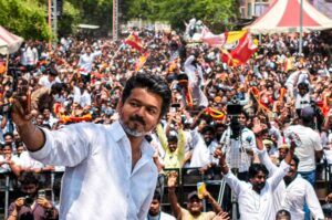 Tamilaga Vettri Kazhagam (TVK) chief and actor Vijay clicks a selfie as he campaigns after filing his nomination papers for the Tamil Nadu Assembly elections from the Perambur constituency, in Chennai. (Handout via PTI Photo)(PTI03_30_2026_000177B) (PTI)