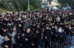 Palestinian Muslim worshippers pray by a road to mark the end of the holy fasting month of Ramadan, as they are not permitted to attend the Eid al-Fitr prayers at Al-Aqsa compound, also known to Jews as the Temple Mount, following restrictions on gathering in large groups, amid the U.S.-Israeli conflict with Iran, in Jerusalem, March 20, 2026. REUTERS/Ammar Awad (REUTERS)