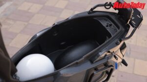 The 12-litre glove box adds a bottle holder, 12V charger and rubber lining, though its charging flap lever feels flimsy. The 43-litre underseat storage is genuinely spacious and practical.