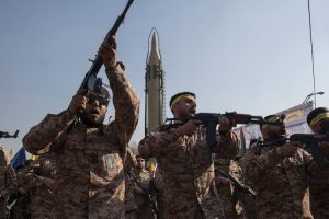 Armed personnel of the Islamic Revolutionary Guard Corps (IRGC) carry AK-47 rifles and march under an Iranian-made long-range surface-to-surface missile during a military rally in downtown Tehran, Iran, on January 10, 2025 (Photo: Getty Images)