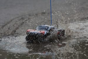 We wasted no time putting the truck back together — the body clipped on, tyres tightened down, and a new set of eight AA batteries slotted into the transmitter. Then we stepped outside, just like we used to.