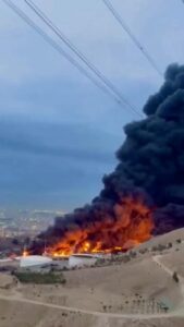 Flames and smoke rise from Tehran’s Shahran oil depot, in Tehran. (Photo: Reuters)