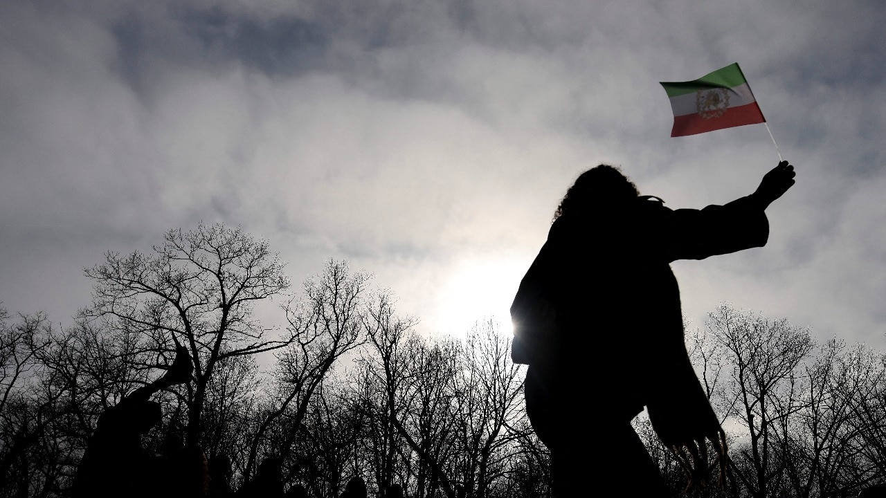 Iranians celebrate the death of their country's Supreme Leader Ayatollah Ali Khamenei in a park in central Bucharest, Romania. (Credits: Reuters)