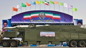Sejjil missile is being moved along the reviewing stand during a military parade in Tehran. (Photo: Reuters)