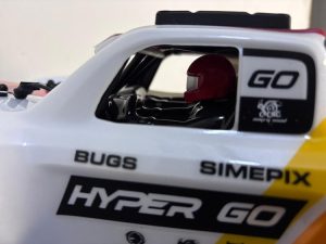 Inside, MJX Hyper Go has fitted a moulded interior featuring two driver figures. The detailing is impressive, with a well-finished dashboard adding to the realism.