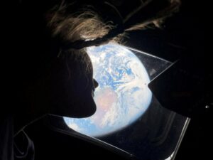 Christina Koch looks at Earth from space aboard the Artemis 2 spacecraft. (Photo: Nasa)