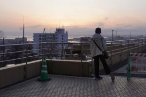 A local resident evacuates to a higher place after a tsunami warning was issued following an earthquake. (Photo: Reuters)