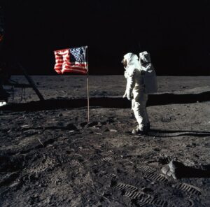 The second human to walk on the moon after Neil Armstrong, Buzz Aldrin is seen here poses for a photograph beside the deployed US flag. (Image: NASA)