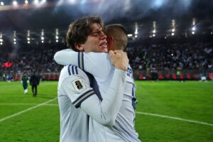 After the shootout loss to Bosnia, Marco Palestra and Leonardo Spinazzola were seen consoling each other. (AP)