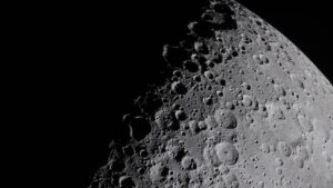 The lunar terminator, the sharp boundary between day and night, casts long shadows over Birkhoff crater to reveal its deep ridges. (Photo: Nasa)