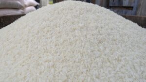 A massive pile of rice, on one rice grain there is text reading "wOw" generated from OpenAI ChatGPT Images 2.0. (Photo: X/@adonis_singh)