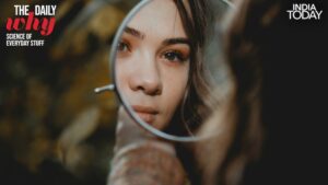 Your brain instinctively imagines walking around the mirror to face yourself in person. This silent mental rotation is what creates the illusion of a left-right reversal. (Photo: Unsplash)