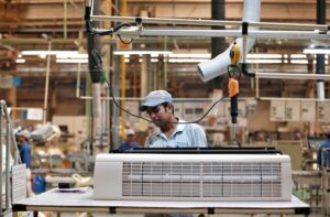 A worker assembles an air conditioner inside the Daikin Industries Ltd. plant in Rajasthan. (Photo: Reuters)