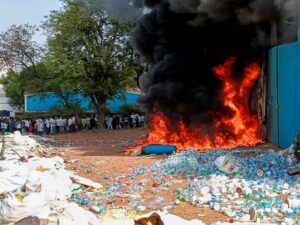 Smoke and flames billow after a fire at a plastic scrap godown. (Photo: PTI)