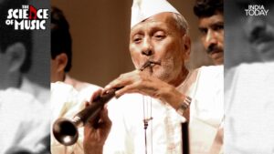 Ustad Bismillah Khan with the shehnai pressed to his lips, captured in a moment of pure absorption. He practised eight to ten hours a day as a young student at the Naubat Khana of the Balaji temple in Varanasi, and continued practising twice a day, two hours at a time, until the last days of his life. (Photo: PTI)