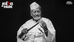 Ustad Bismillah Khan with the shehnai, eyes closed, lost in a moment of music. The flared metal bell at the end of the instrument is not decorative; it performs the same acoustic function as a megaphone for a human voice, allowing more of the sound to leave the instrument and travel outward into the world. (Photo: PTI)